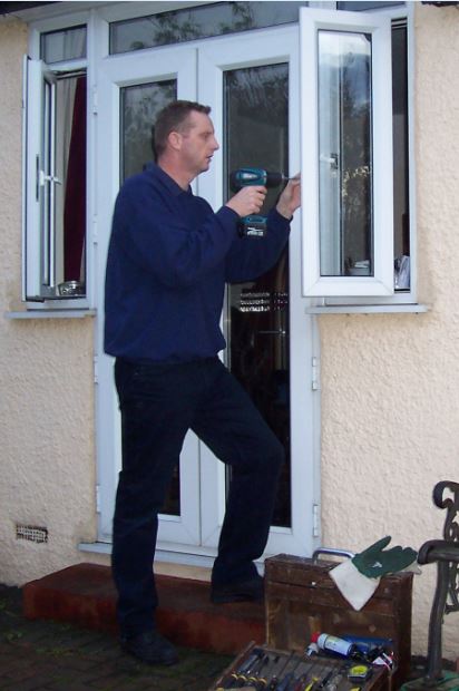 Top and Bottom hung hinges on a upvc double glazed casement window attached to UPVC French doors Wilmington